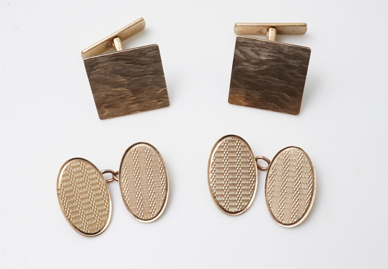 Two pairs of gold cufflinks